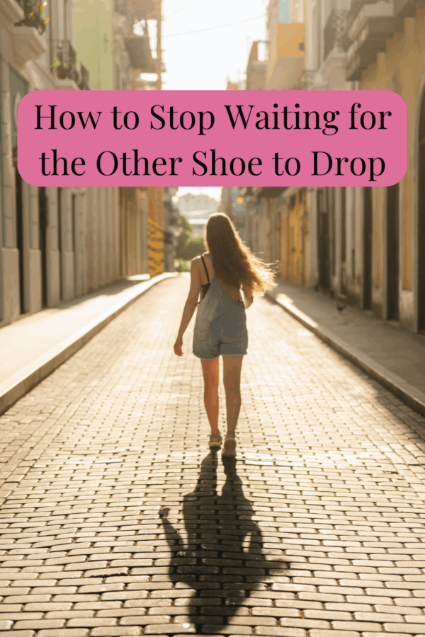 a woman walking down the street